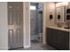 Bathroom with a walk-in shower, vanity with storage, and modern fixtures at 1333 N Higley Rd # 7, Mesa, AZ 85205