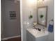 Bright bathroom with a large framed mirror, neutral color palette, and decorative accents at 1333 N Higley Rd # 7, Mesa, AZ 85205