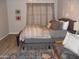 Cozy bedroom featuring a comfortable bed, soft lighting, and a relaxing atmosphere at 1333 N Higley Rd # 7, Mesa, AZ 85205