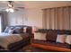 Comfortable bedroom with a bed and a futon, offering a flexible living space at 1333 N Higley Rd # 7, Mesa, AZ 85205
