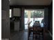 Dining room with a view of the outdoor pool area through sliding glass doors at 1333 N Higley Rd # 7, Mesa, AZ 85205