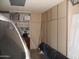 Spacious garage interior featuring abundant cabinet storage for tools and other household items at 1333 N Higley Rd # 7, Mesa, AZ 85205