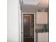 Hallway view with access to laundry room at 1333 N Higley Rd # 7, Mesa, AZ 85205
