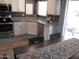 Updated kitchen features stainless steel appliances and granite countertops at 1333 N Higley Rd # 7, Mesa, AZ 85205