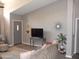 Open living room features vaulted ceilings and neutral paint at 1333 N Higley Rd # 7, Mesa, AZ 85205