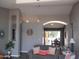 Cozy living room with neutral tones and a glimpse of the dining area with backyard access at 1333 N Higley Rd # 7, Mesa, AZ 85205