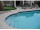 Inviting pool with steps, poolside seating and a putting green for hours of backyard fun at 1333 N Higley Rd # 7, Mesa, AZ 85205