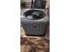 Close-up of a Ruud central air conditioning unit for home cooling at 1440 N Idaho Rd # 1022, Apache Junction, AZ 85119