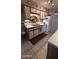 Functional kitchen featuring ample cabinet space and essential appliances at 1440 N Idaho Rd # 1022, Apache Junction, AZ 85119