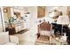 Cozy eat-in kitchen has white cabinets and updated appliances, offering a comfortable and functional space for cooking at 1440 N Idaho Rd # 1022, Apache Junction, AZ 85119