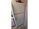 Clean, white refrigerator with top freezer, fitting neatly into the kitchen space at 1440 N Idaho Rd # 1022, Apache Junction, AZ 85119
