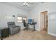Bedroom featuring tile floors, neutral colors, with a desk area and an adjacent doorway at 1623 E Runion Dr, Phoenix, AZ 85024