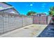 Driveway gate and concrete driveway, with a block fence at 1623 E Runion Dr, Phoenix, AZ 85024