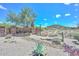 Stone entrance for Scarlet Canyon, showcasing landscaping and signage at 1623 E Runion Dr, Phoenix, AZ 85024