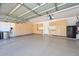 Large garage with epoxy floor and tons of storage cabinets at 1623 E Runion Dr, Phoenix, AZ 85024