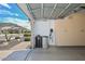 Garage interior featuring storage cabinets and water filtration system at 1623 E Runion Dr, Phoenix, AZ 85024