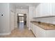 Hallway with lots of storage space that overlooks the pool, with access to other rooms at 1623 E Runion Dr, Phoenix, AZ 85024