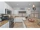 Well-equipped kitchen features granite countertops, stainless steel appliances, and ample counter space at 1623 E Runion Dr, Phoenix, AZ 85024