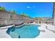 Sparkling pool with relaxing waterfall feature and plenty of space for outdoor enjoyment at 1623 E Runion Dr, Phoenix, AZ 85024