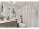 Bathroom with a shower and tub combo and modern fixtures at 1633 E Lakeside Dr # 156, Gilbert, AZ 85234