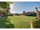 Beautiful view of a large green space surrounded by residences in a well-maintained community at 1633 E Lakeside Dr # 156, Gilbert, AZ 85234