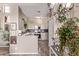 Bright kitchen with wooden floors, stainless steel appliances, and a breakfast bar at 1633 E Lakeside Dr # 156, Gilbert, AZ 85234