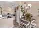 An open kitchen featuring modern appliances, a breakfast bar, and decorative lighting at 1633 E Lakeside Dr # 156, Gilbert, AZ 85234