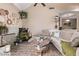 Bright living room with wooden floors, stylish decor, and comfortable sectional sofa at 1633 E Lakeside Dr # 156, Gilbert, AZ 85234