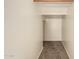 Neutral hallway with carpet flooring and ample space for storage or decor at 16450 W Lilac St, Goodyear, AZ 85338