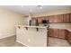 Well-equipped kitchen with breakfast bar and plenty of counter space at 16450 W Lilac St, Goodyear, AZ 85338