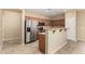 Modern kitchen with stainless steel appliances and ample cabinet space at 16450 W Lilac St, Goodyear, AZ 85338