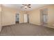 Large main bedroom with neutral walls and carpet flooring at 16450 W Lilac St, Goodyear, AZ 85338