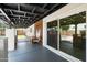 Relaxing covered patio with outdoor seating, offering a view of the backyard and pool at 1713 W Royal Palm Rd, Phoenix, AZ 85021