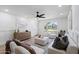 Inviting living room with light-colored furniture, stylish decor, and plenty of natural light at 1713 W Royal Palm Rd, Phoenix, AZ 85021