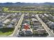 Aerial view of a home in a residential neighborhood, showcasing the community layout with mountain views at 17146 W Mountainair St, Surprise, AZ 85388