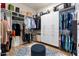 Spacious walk-in closet with custom shelving, drawers, and ample storage space at 17146 W Mountainair St, Surprise, AZ 85388