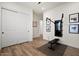 Flex room featuring a murphy bed and versatile exercise equipment at 17146 W Mountainair St, Surprise, AZ 85388