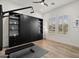 Flex room with murphy bed, storage, and natural light from shuttered windows at 17146 W Mountainair St, Surprise, AZ 85388