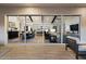 Open-concept living space with views of the backyard, dining room, kitchen and Gathering room at 17146 W Mountainair St, Surprise, AZ 85388
