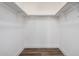 Walk-in closet with laminate floors and white walls, perfect for storage and organization at 17201 N 35Th Dr, Glendale, AZ 85308