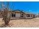 Charming single-story home with a desert landscape and a welcoming front porch, perfect for comfortable living at 17201 N 35Th Dr, Glendale, AZ 85308