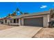 Charming single-story home featuring a spacious driveway and a two-car garage, perfect for comfortable living at 17201 N 35Th Dr, Glendale, AZ 85308