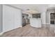 Modern kitchen with stainless steel appliances, white cabinetry, and ample counter space, perfect for culinary enthusiasts at 17201 N 35Th Dr, Glendale, AZ 85308