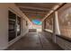 A covered patio space with a brick wall at 17201 N 35Th Dr, Glendale, AZ 85308