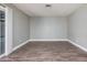 Bright, versatile room with neutral paint, stylish floors, and natural light, ideal for a home office or extra bedroom at 17201 N 35Th Dr, Glendale, AZ 85308