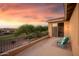 Balcony view with outdoor seating, offering scenic landscape views, and a relaxing space at 18432 W Port Royale Ln, Surprise, AZ 85388