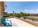 Inviting balcony with scenic views, comfortable seating, and natural light, perfect for relaxation and enjoyment at 18432 W Port Royale Ln, Surprise, AZ 85388