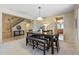 Stylish dining area with a modern table and seating, perfect for gatherings at 18432 W Port Royale Ln, Surprise, AZ 85388