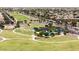 Expansive green community park with walking paths, playground, and sports facilities, enhancing outdoor living at 18432 W Port Royale Ln, Surprise, AZ 85388