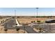 Well-maintained recreational fields and parking area are seen in this listing image at 18432 W Port Royale Ln, Surprise, AZ 85388